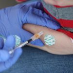 Top FDA vaccine official rejected broad use of Covid-19 shots, documents show